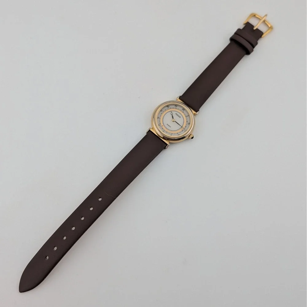 Pulsar V249-0030 Date Pointer Gold Tone White Dial Brown Leather Women's Watch